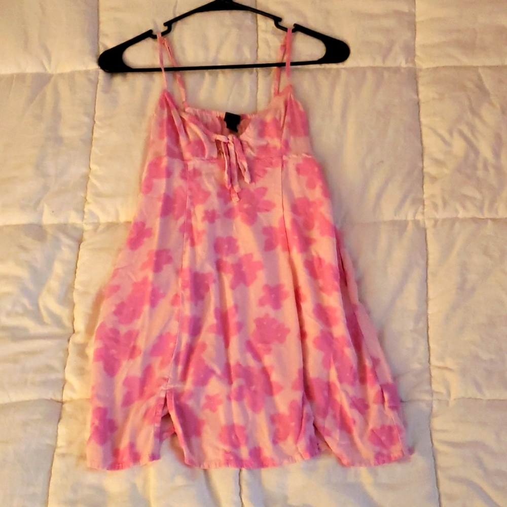 This is an extra small summer dress with pockets. It is perfect for the beach.